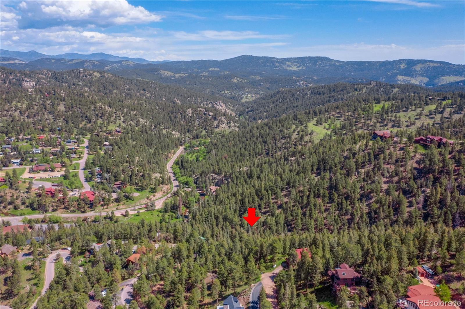 4465 Forest Trail Evergreen, CO 80439 - Photo 15 of 19 a view of a city and mountains