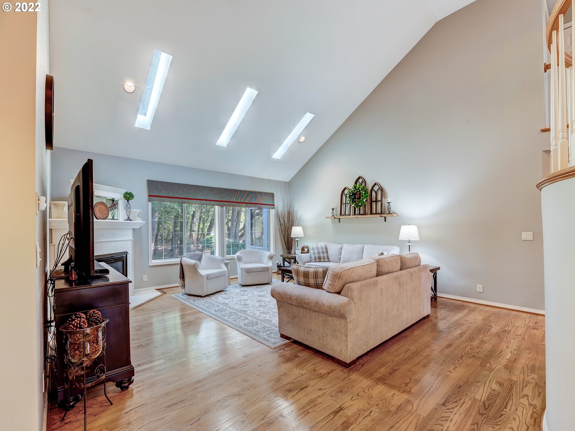 28244 Edgewater Drive Eugene, OR 97402 - Photo 13 of 30 a living room with furniture and a flat screen tv