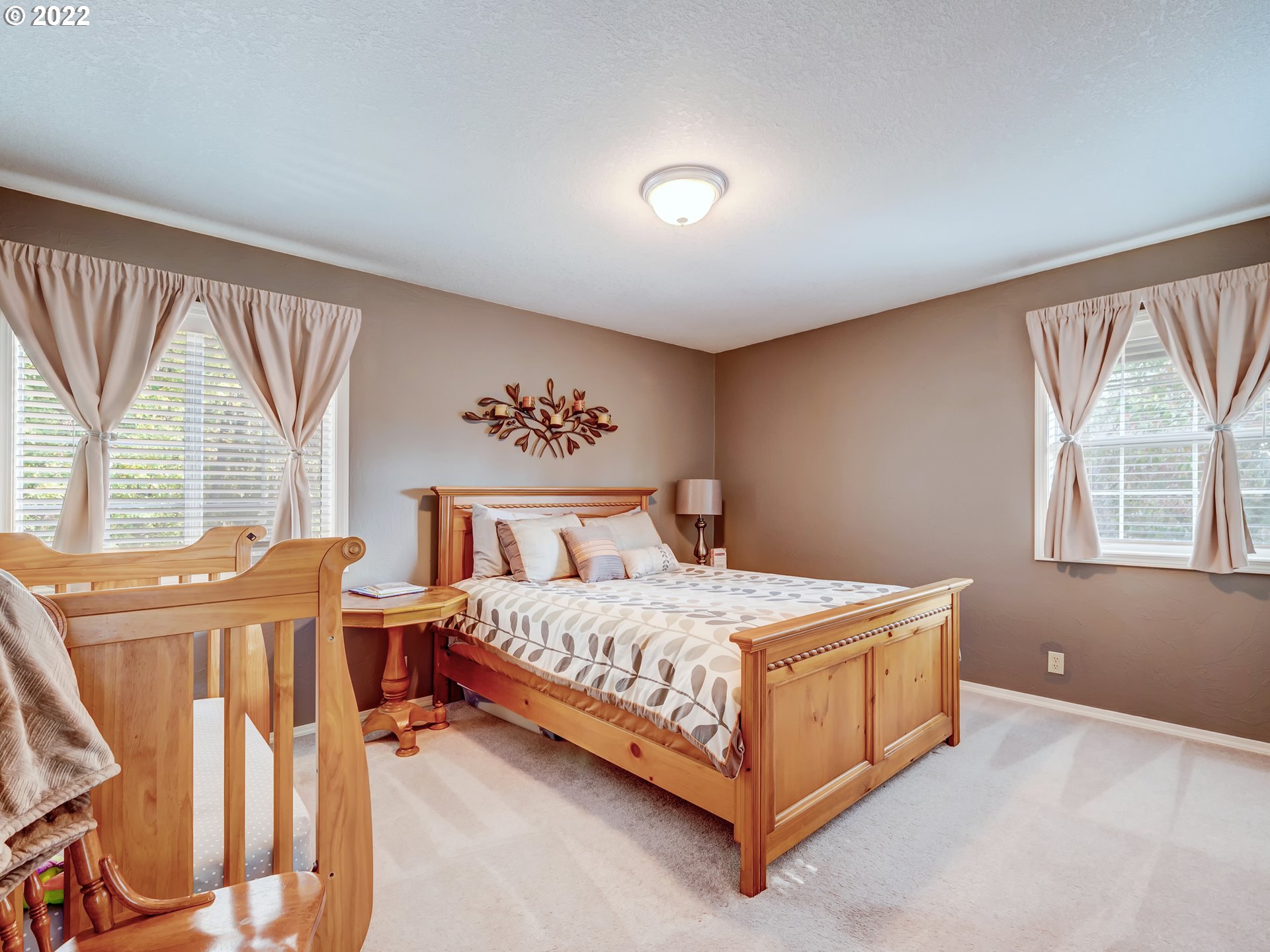 28244 Edgewater Drive Eugene, OR 97402 - Photo 20 of 30 a bedroom with a bed and window