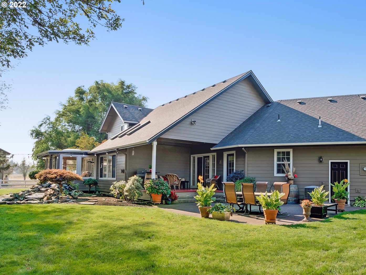 28244 Edgewater Drive Eugene, OR 97402 - Photo 28 of 30 a front view of a house with garden and porch