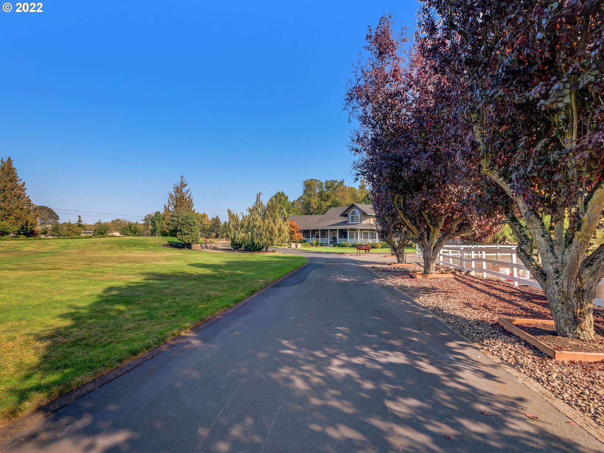 28244 Edgewater Drive Eugene, OR 97402 - Photo 3 of 30 a view of a garden with an trees