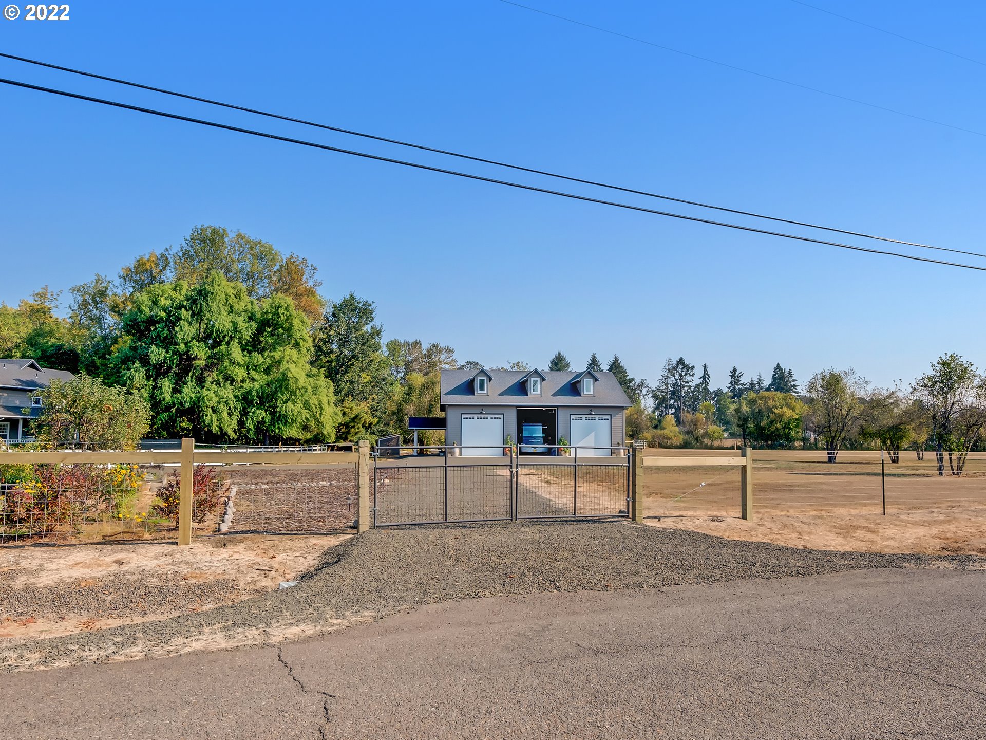 28244 Edgewater Drive Eugene, OR 97402 - Photo 4 of 30 front view of a house with a road