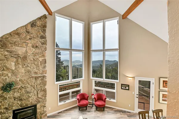 a room with furniture and a window