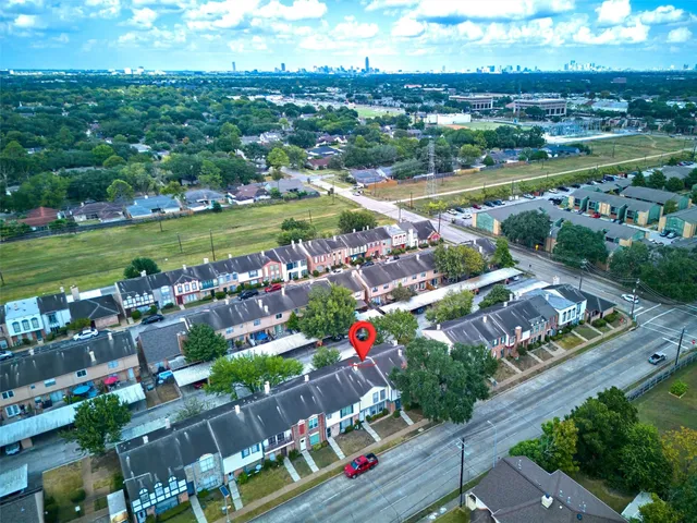 a view of a city with lots of trees