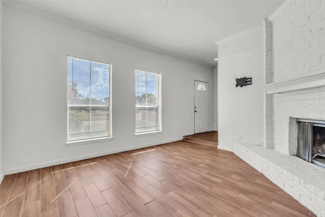 an empty room with windows