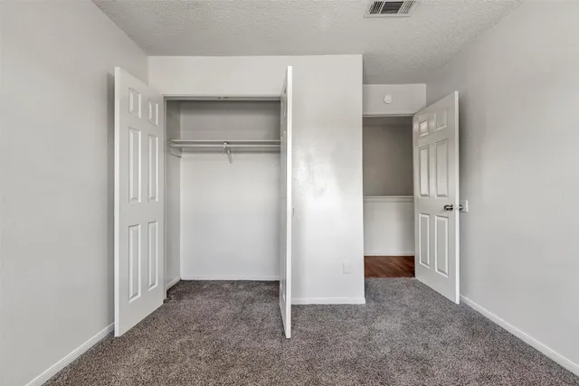 an empty room with closet