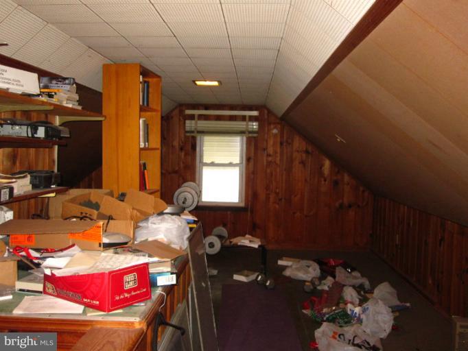 1902 Washington Road Baltimore, MD 21222 - Photo 7 of 18 a room with furniture a rug and a potted plant