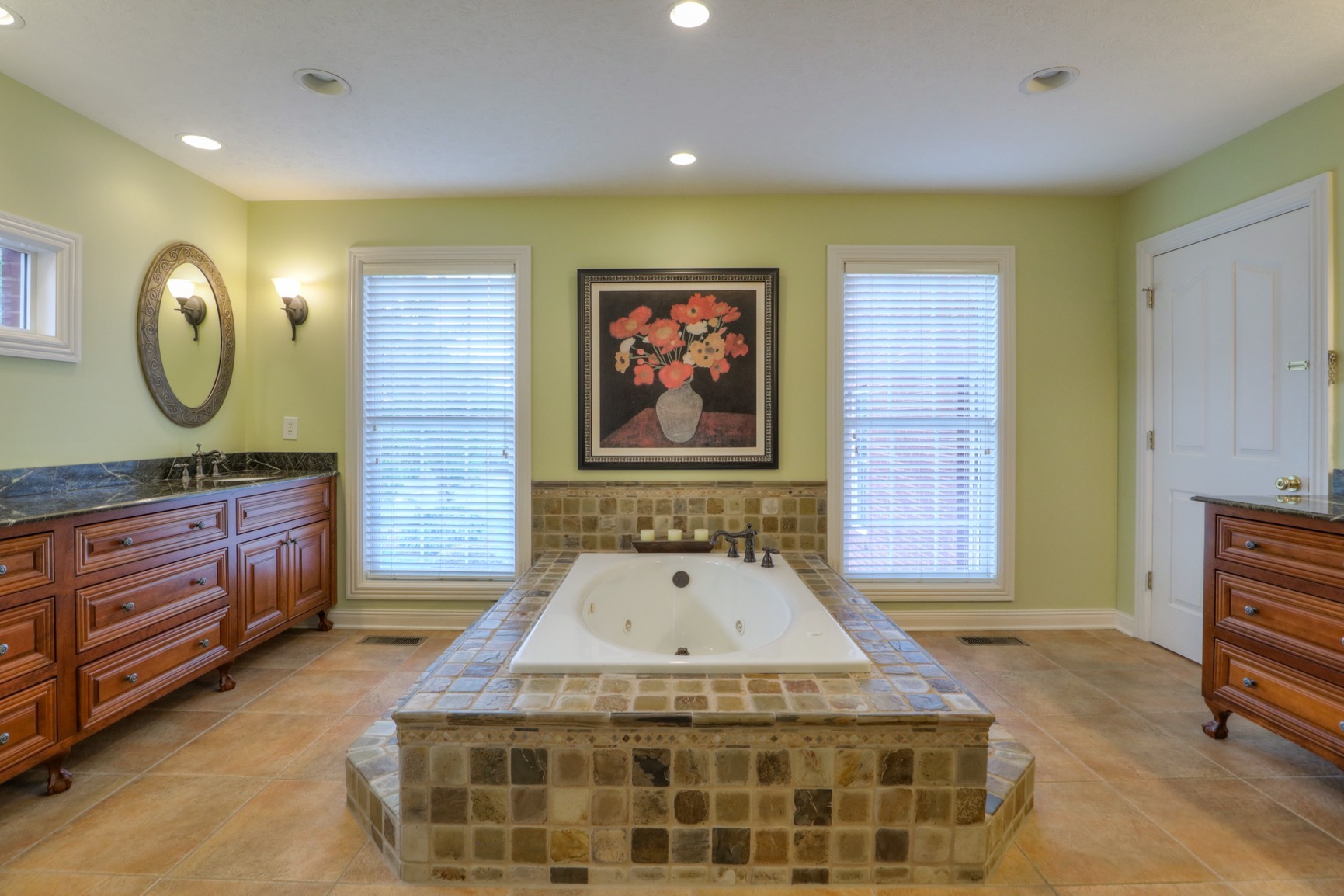 505 Bethlehem Road Lebanon, TN 37087 - Photo 14 of 44 a spacious bathroom with a granite countertop sink and a mirror