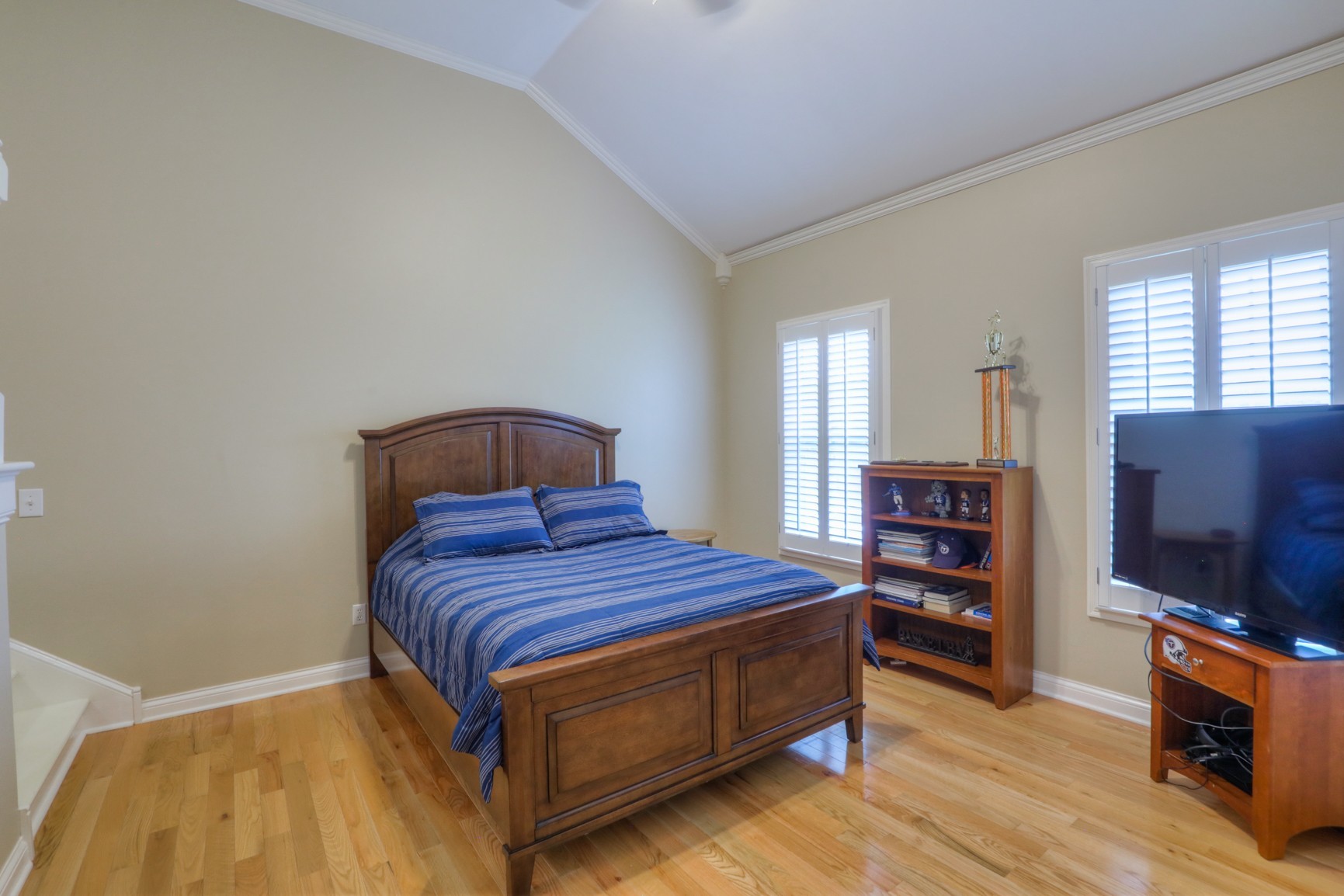 505 Bethlehem Road Lebanon, TN 37087 - Photo 18 of 44 a bedroom with a bed and a flat screen tv