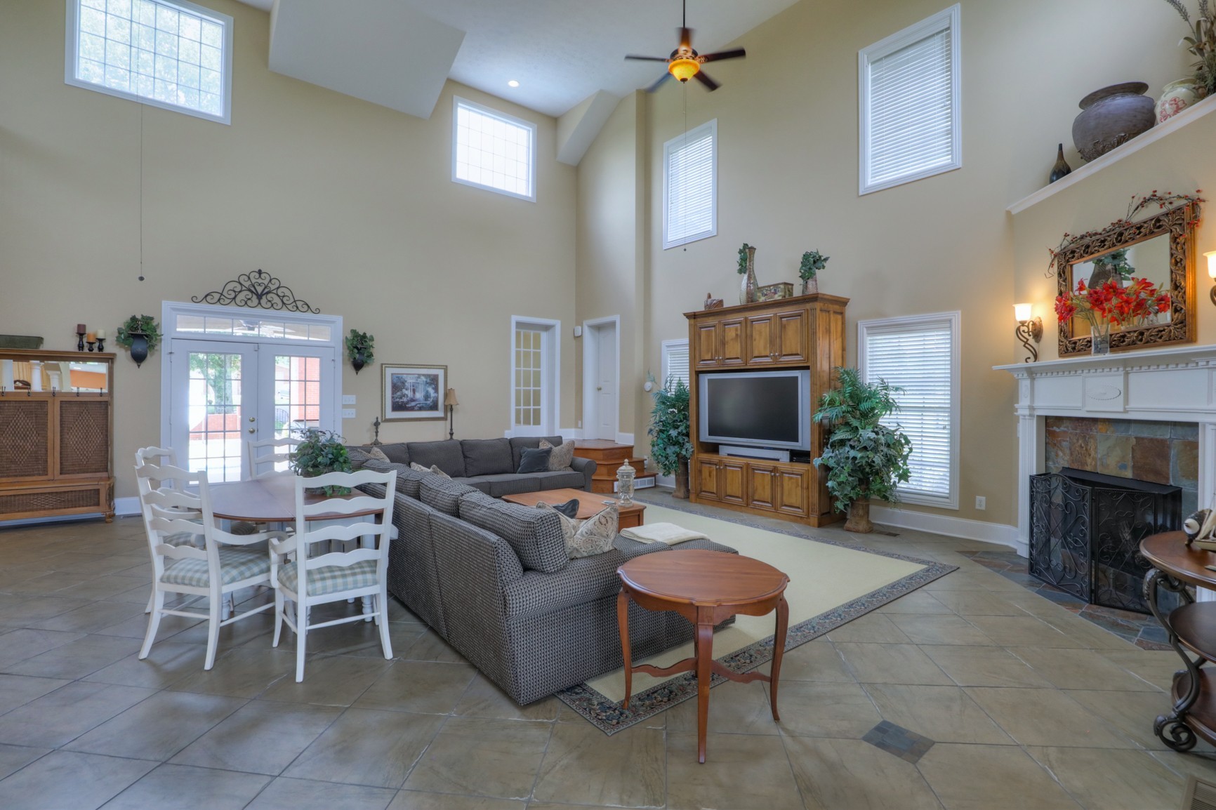505 Bethlehem Road Lebanon, TN 37087 - Photo 24 of 44 a living room with furniture a fireplace and a flat screen tv
