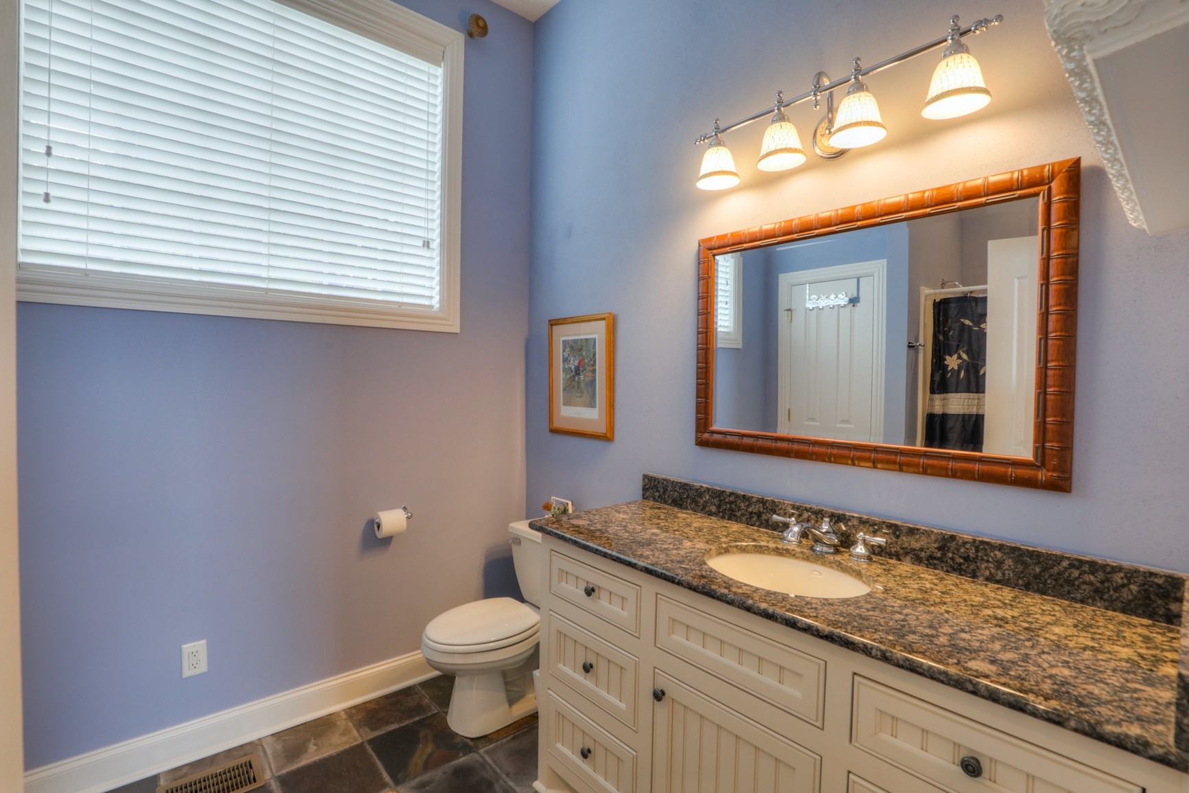 505 Bethlehem Road Lebanon, TN 37087 - Photo 29 of 44 a bathroom with a granite countertop sink and a toilet