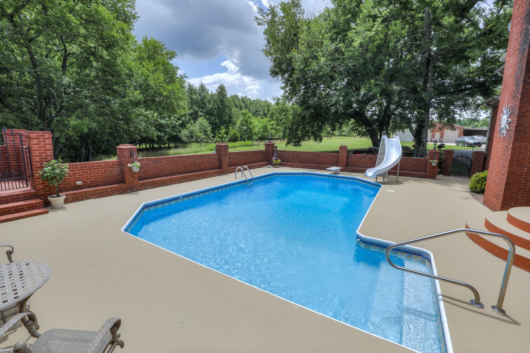 505 Bethlehem Road Lebanon, TN 37087 - Photo 32 of 44 a view of a swimming pool with a lounge chair