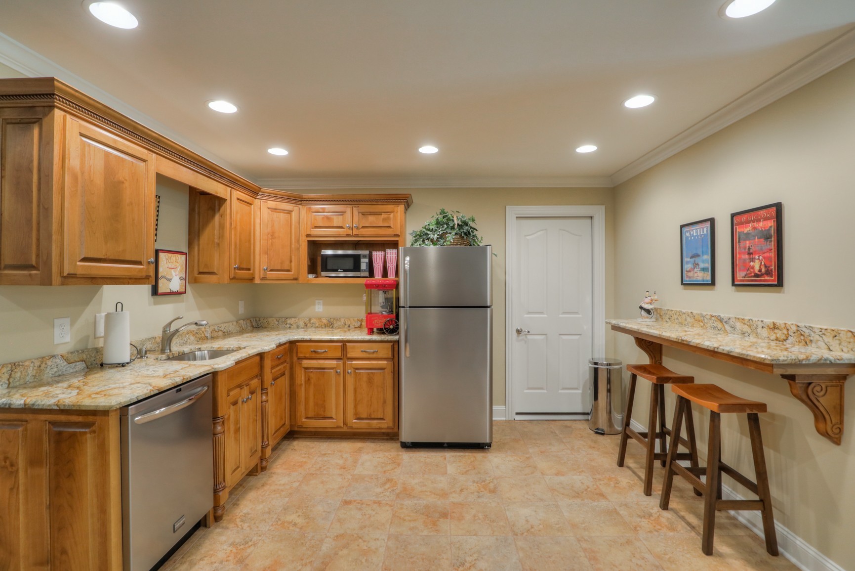505 Bethlehem Road Lebanon, TN 37087 - Photo 34 of 44 a kitchen with stainless steel appliances granite countertop a refrigerator and a stove top oven
