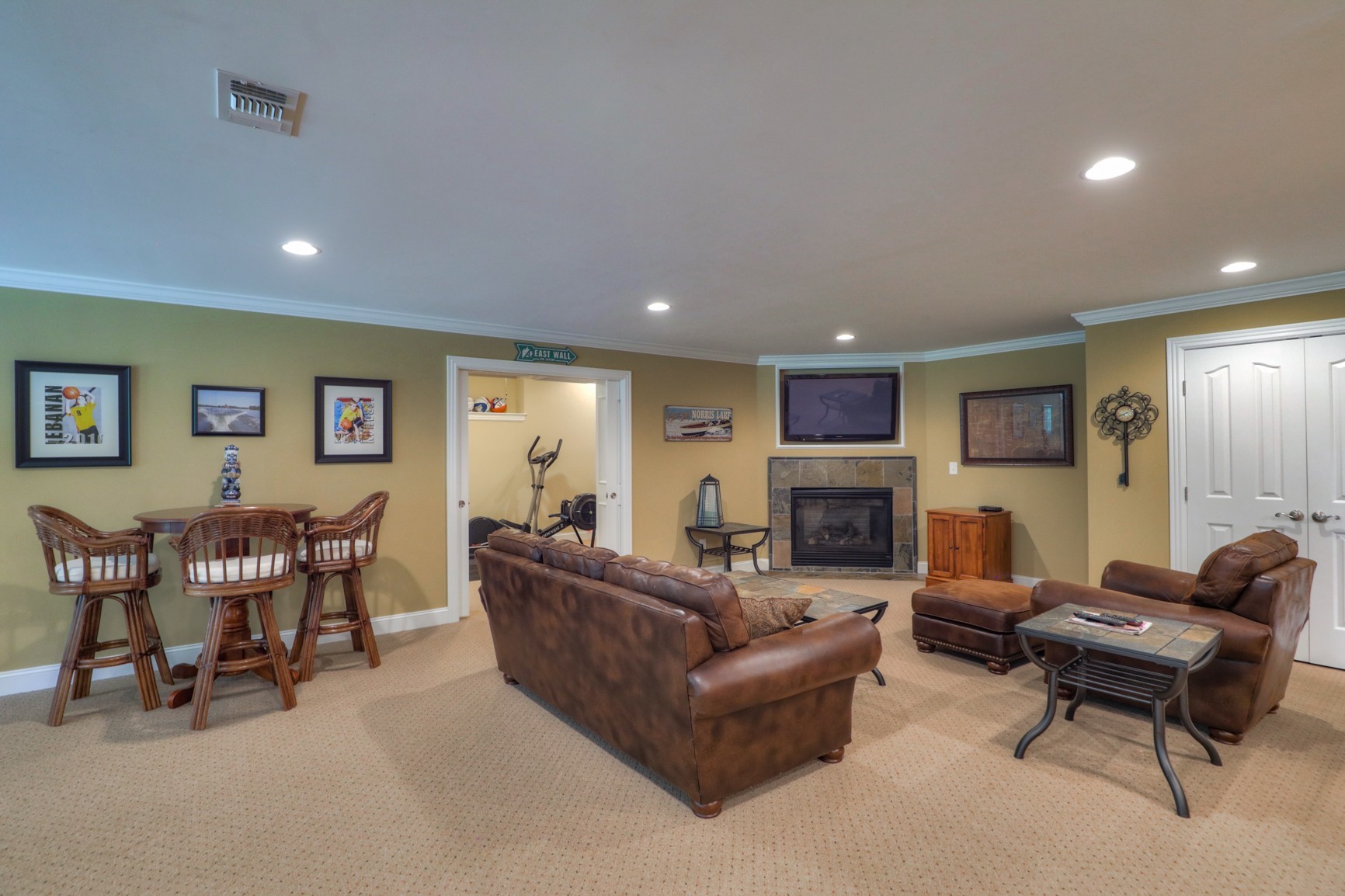 505 Bethlehem Road Lebanon, TN 37087 - Photo 36 of 44 a living room with furniture a fireplace a projector and a window
