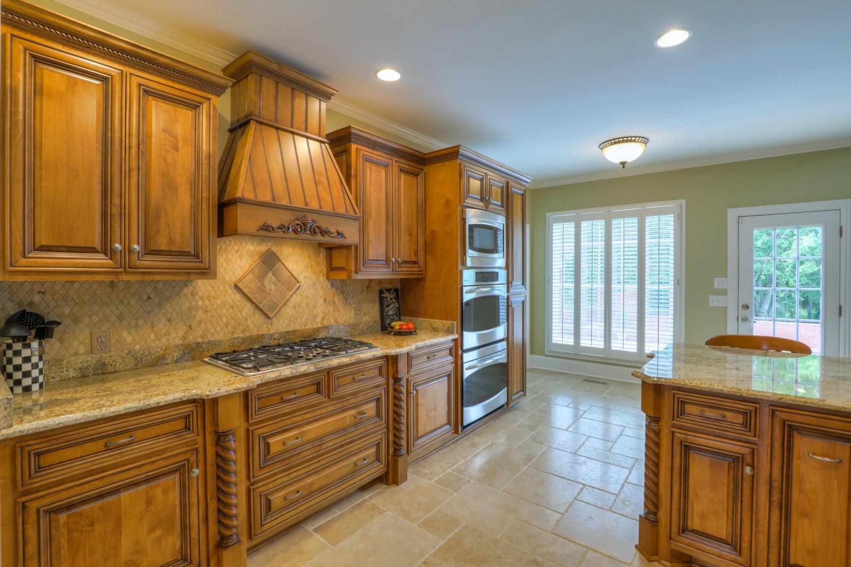 505 Bethlehem Road Lebanon, TN 37087 - Photo 6 of 44 a kitchen with stainless steel appliances granite countertop a stove a sink and dishwasher