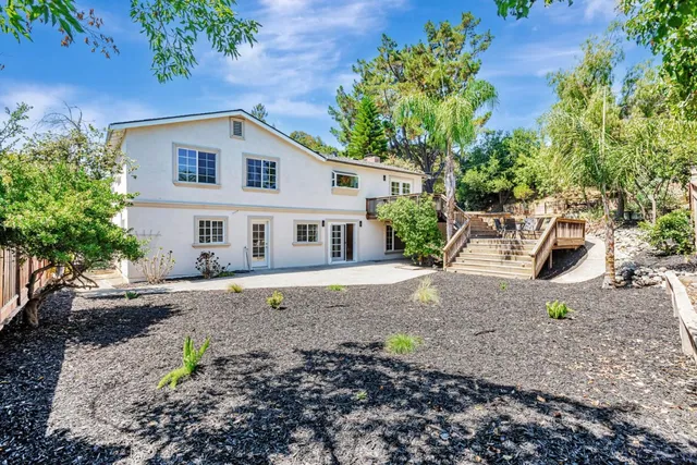 a backyard of a house with lots of green space