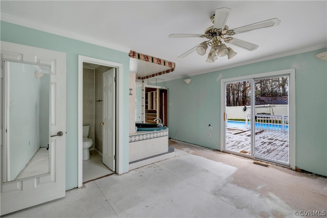 4859 Wedgemere Road Chesterfield, VA 23832 - Photo 12 of 21 a view of a livingroom with an empty space and a ceiling fan
