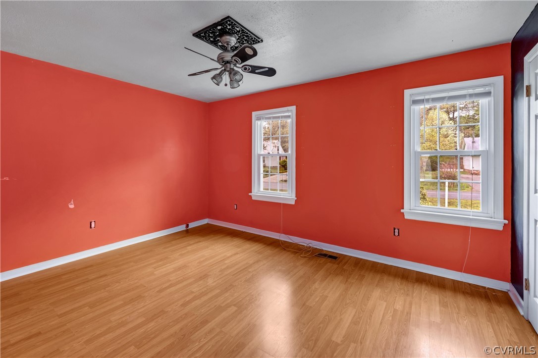 4859 Wedgemere Road Chesterfield, VA 23832 - Photo 17 of 21 a view of empty room with wooden floor and fan