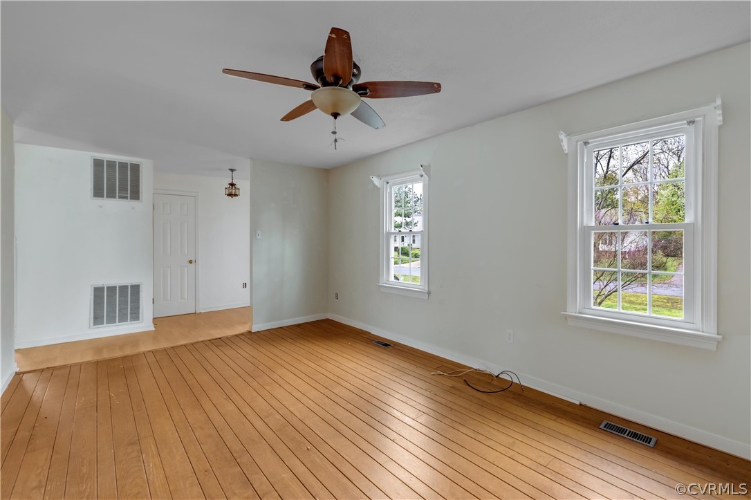 4859 Wedgemere Road Chesterfield, VA 23832 - Photo 5 of 21 a view of empty room with wooden floor and fan