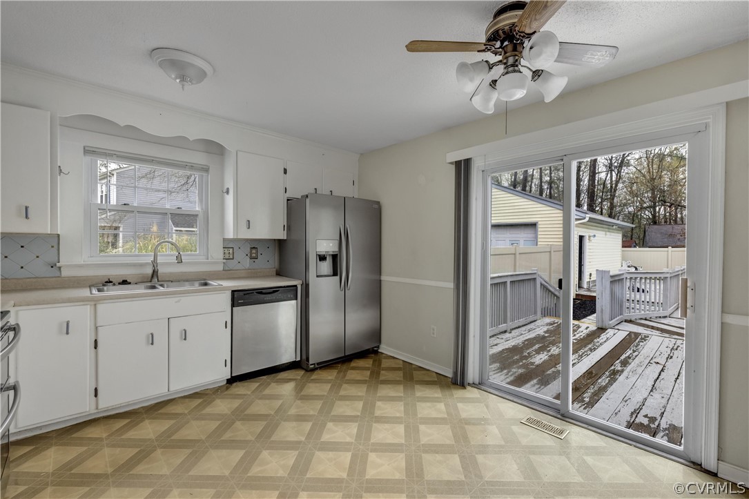 4859 Wedgemere Road Chesterfield, VA 23832 - Photo 6 of 21 a kitchen with stainless steel appliances granite countertop a refrigerator and a sink