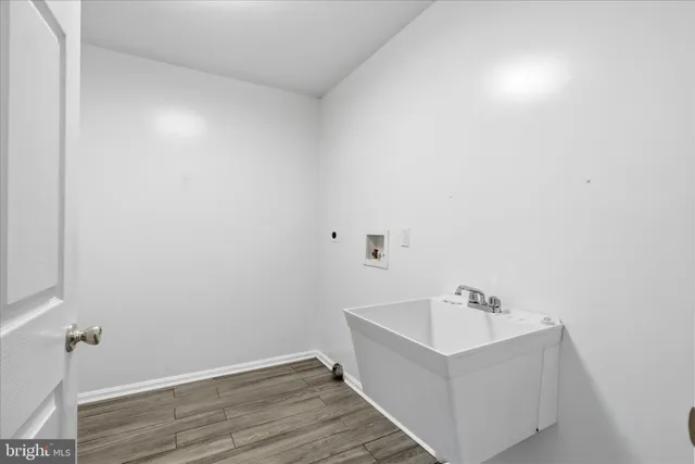 a bathroom with a sink and mirror