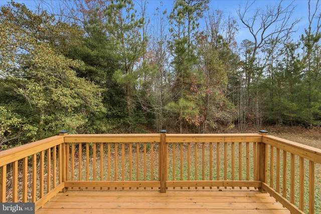 a view of balcony with wooden floor