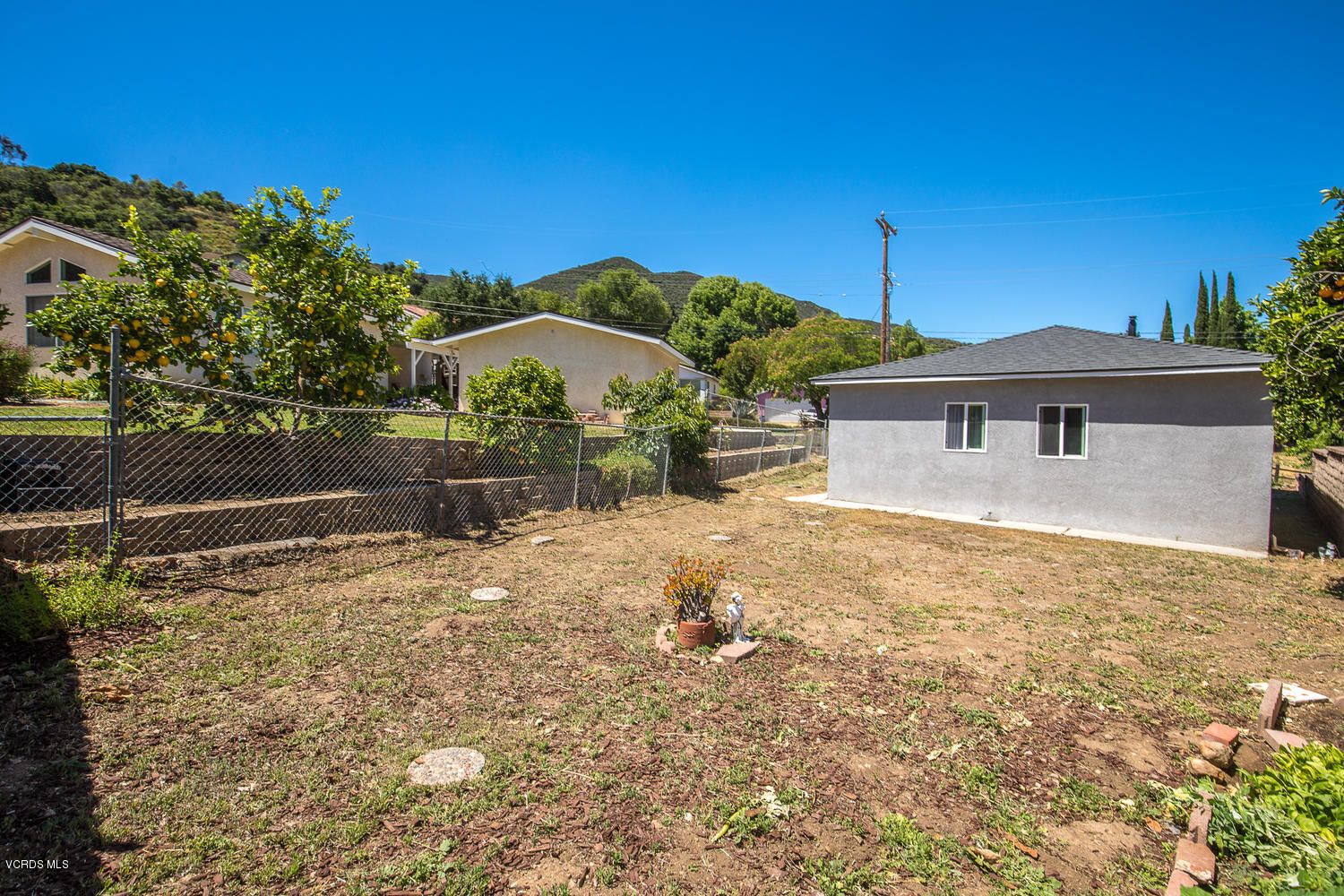 250 Brook Road Newbury Park, CA 91320 - Photo 15 of 18 a front view of a house with a yard