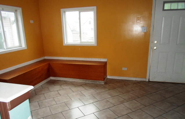 2236 West 47th Place Chicago, IL 60609 - Photo 11 of 18 an empty room with windows