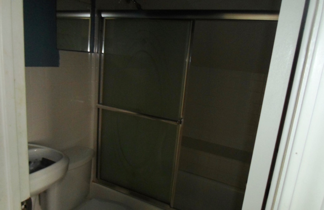 2236 West 47th Place Chicago, IL 60609 - Photo 14 of 18 a bathroom with a toilet