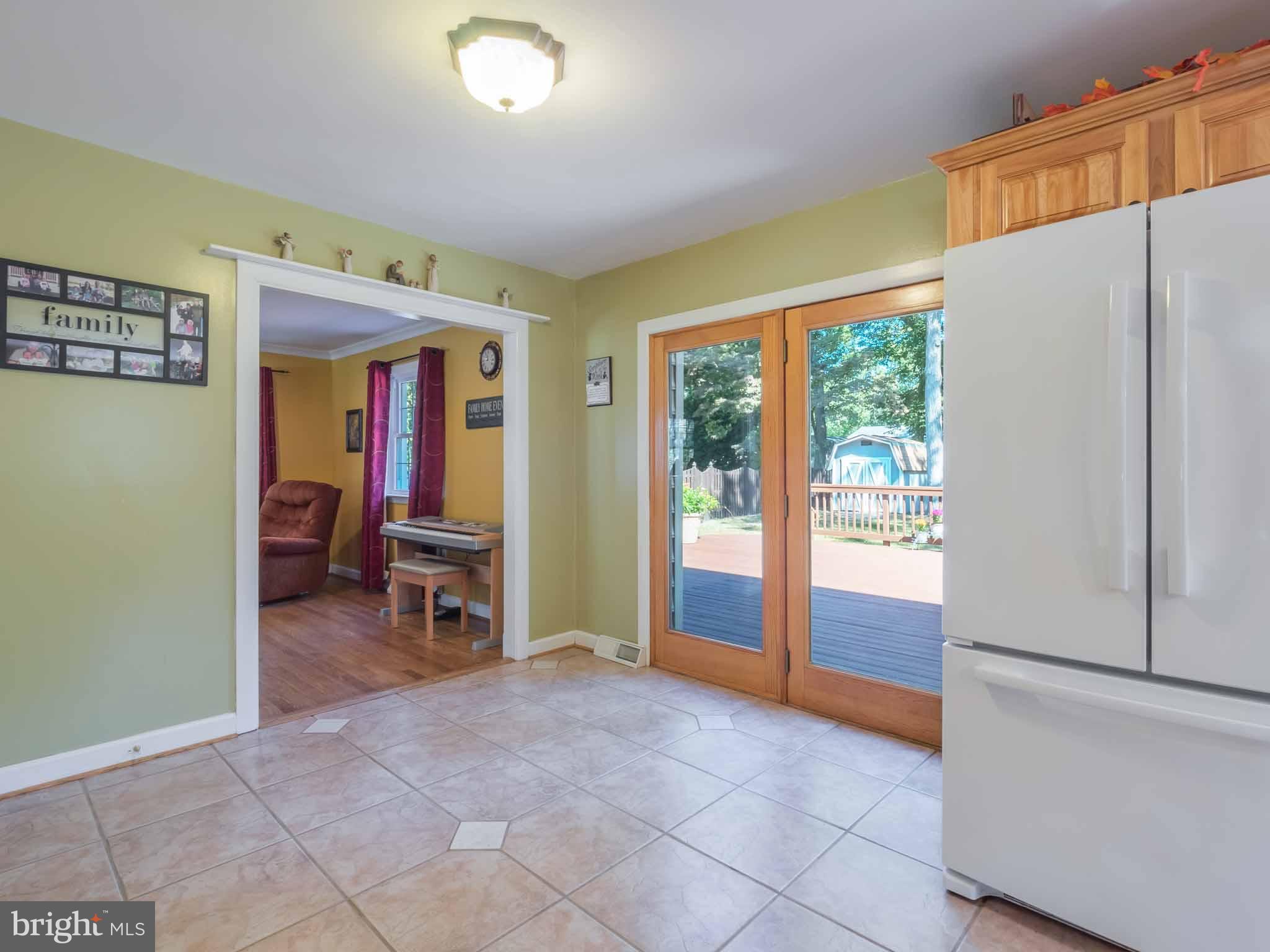 814 Danza Road Severn, MD 21144 - Photo 15 of 30 Kitchen entrance to the back deck