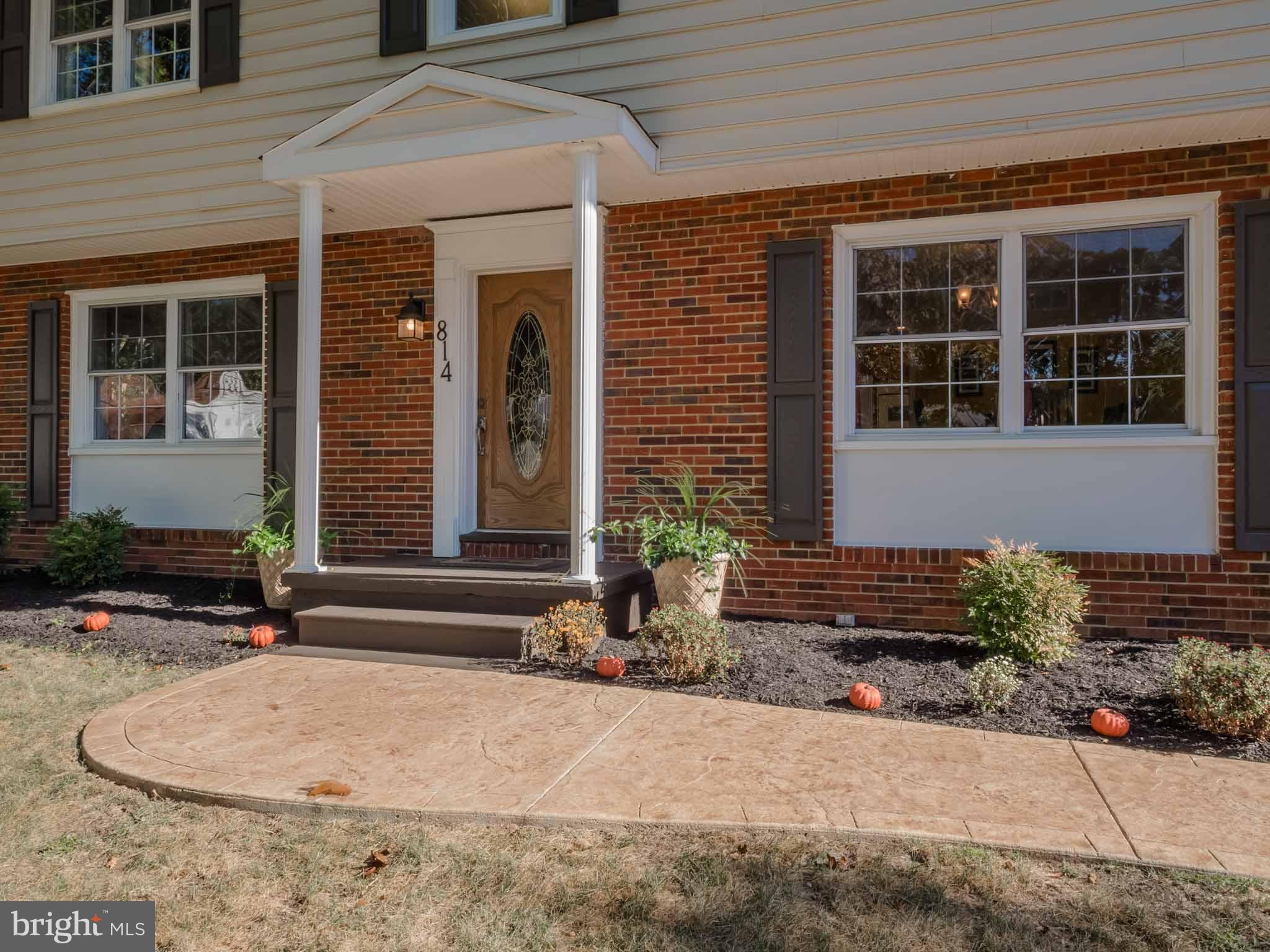 814 Danza Road Severn, MD 21144 - Photo 3 of 30 Beautiful stamped concrete pathway to front door
