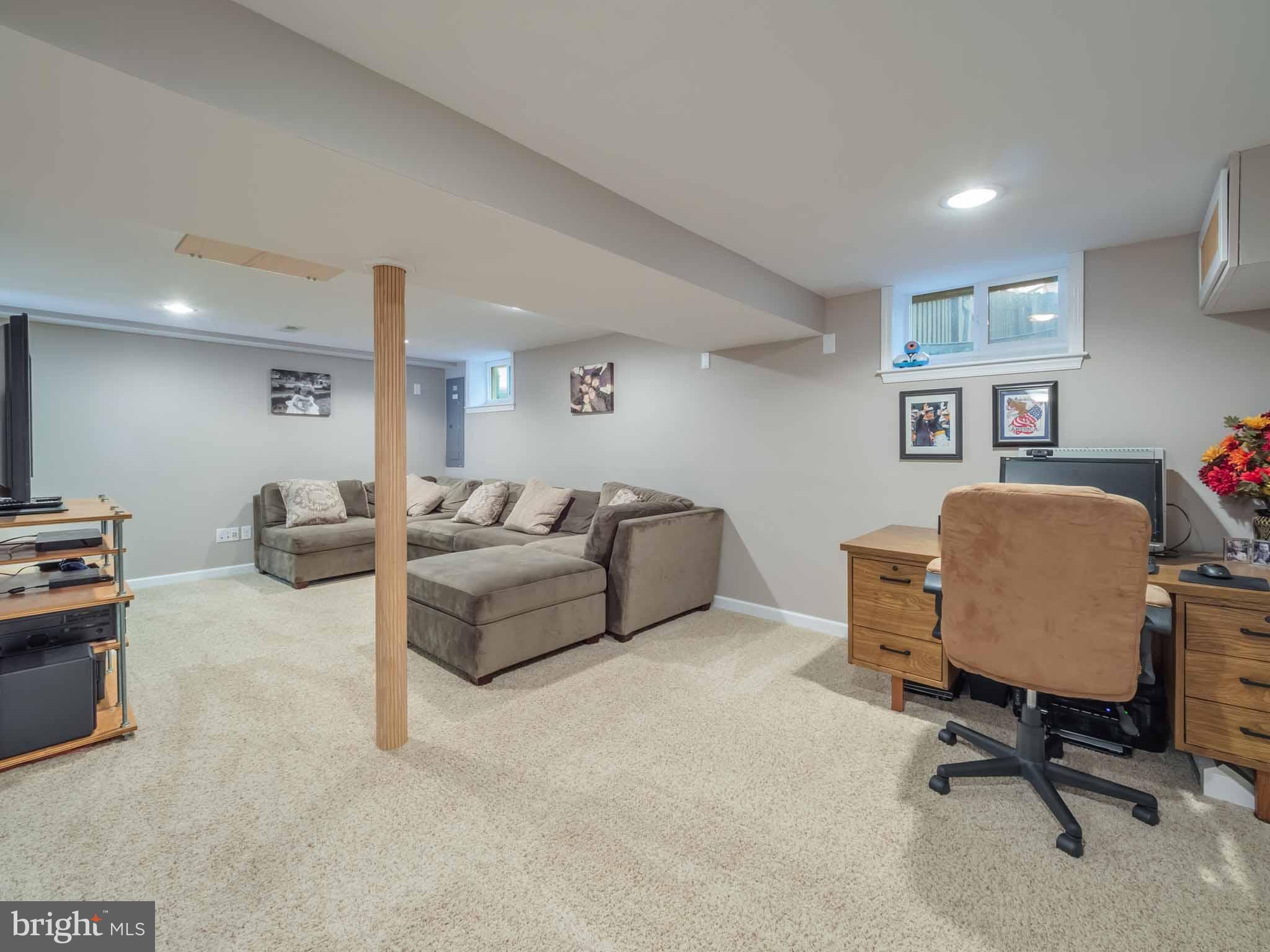 814 Danza Road Severn, MD 21144 - Photo 28 of 30 Lower level family room is carpeted