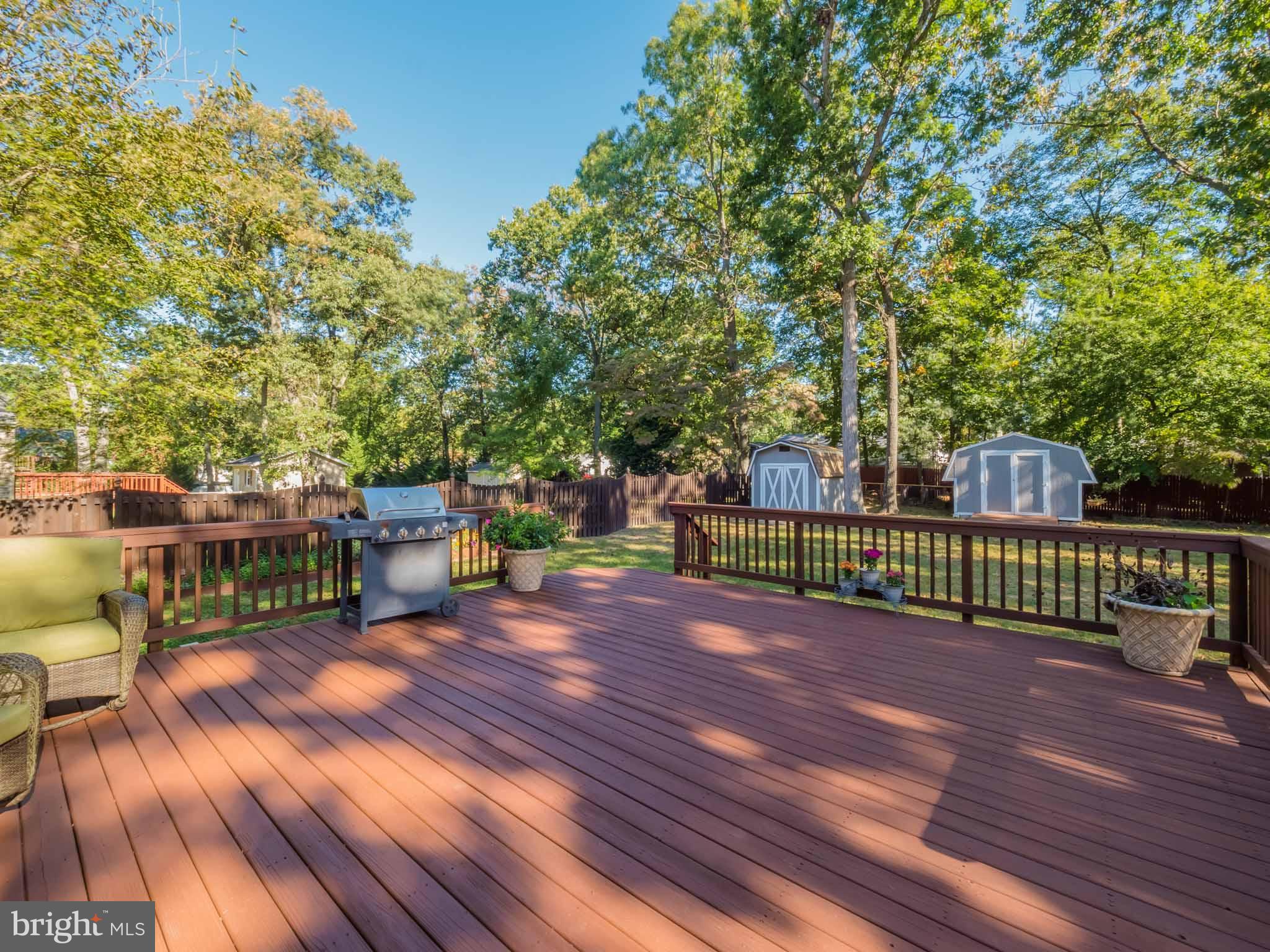 814 Danza Road Severn, MD 21144 - Photo 7 of 30 Newly stained large deck. Perfect for entertaining
