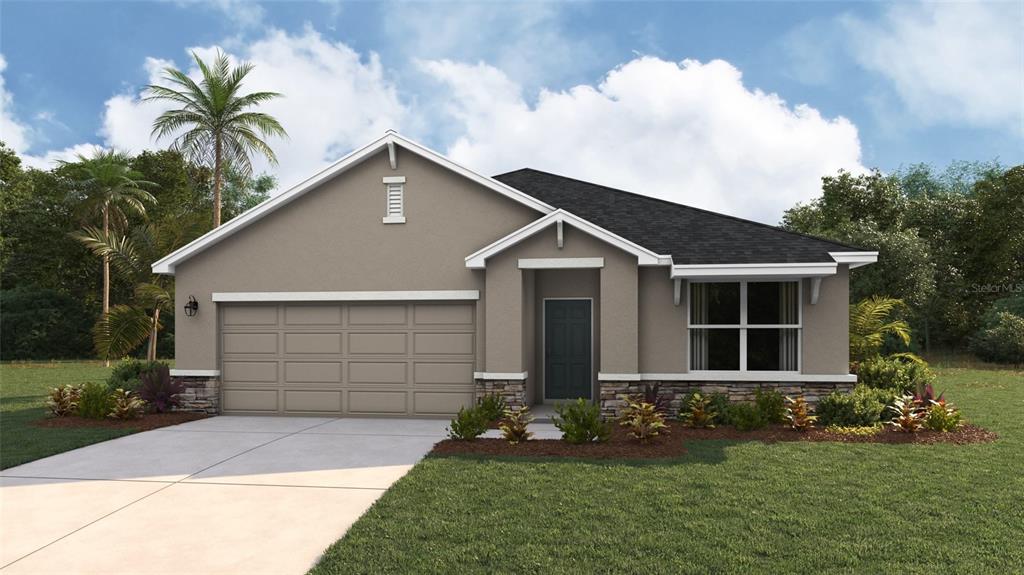 a front view of house with yard and green space