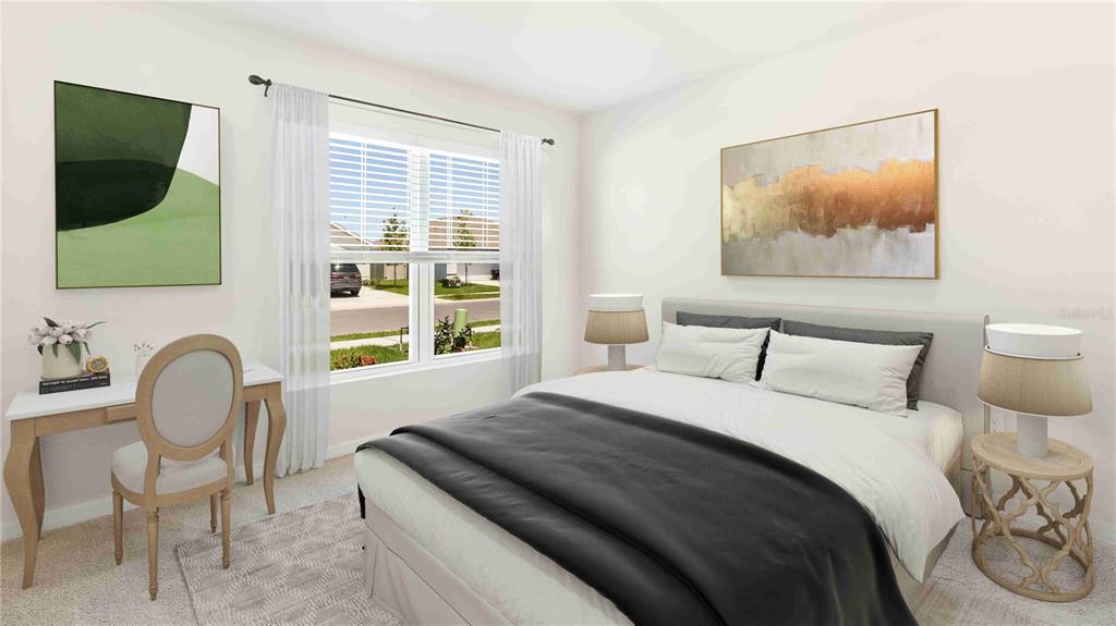 10931 Rabbit Grove Trail Palmetto, FL 34221 - Photo 13 of 30 a bedroom with a bed and a flat screen tv
