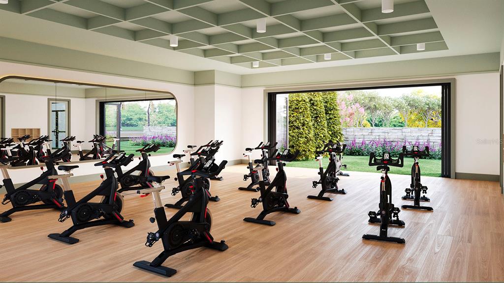 10931 Rabbit Grove Trail Palmetto, FL 34221 - Photo 28 of 30 a view of a room with gym equipment