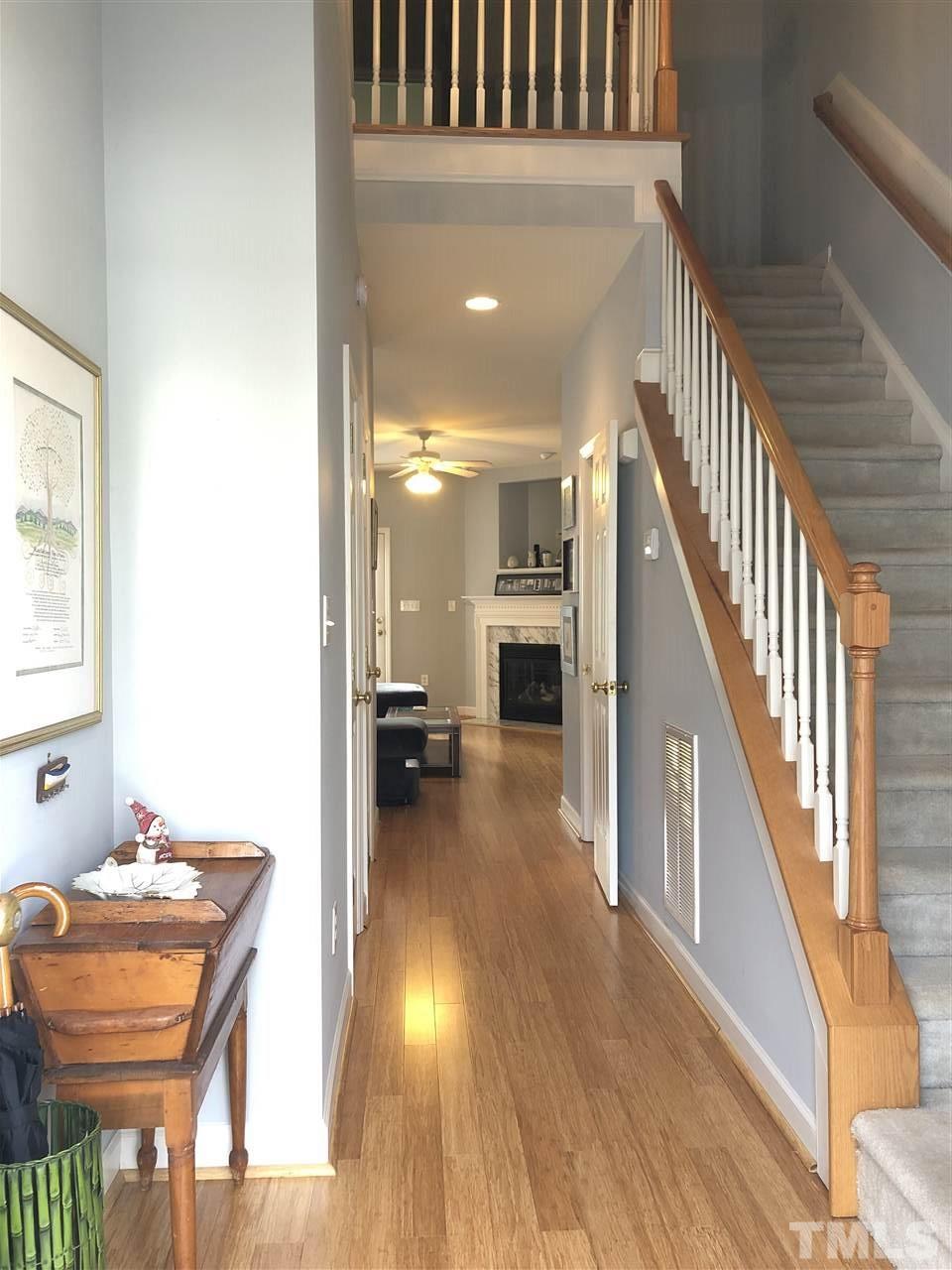5426 Goldenglow Way Raleigh, NC 27606 - Photo 11 of 25 a view of a hallway with furniture and entryway