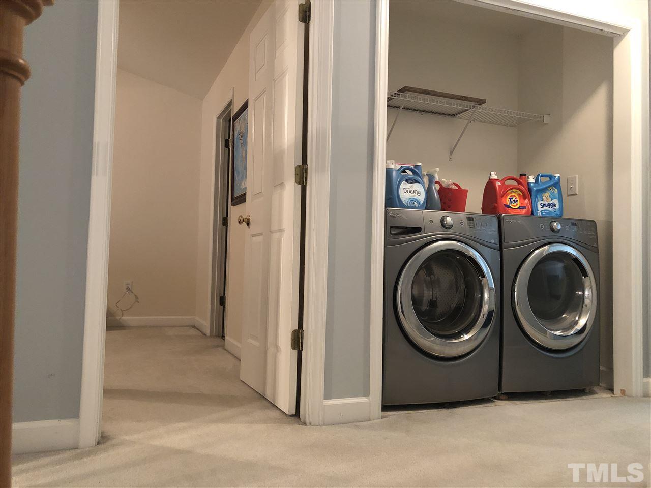 5426 Goldenglow Way Raleigh, NC 27606 - Photo 21 of 25 a utility room with dryer and washer