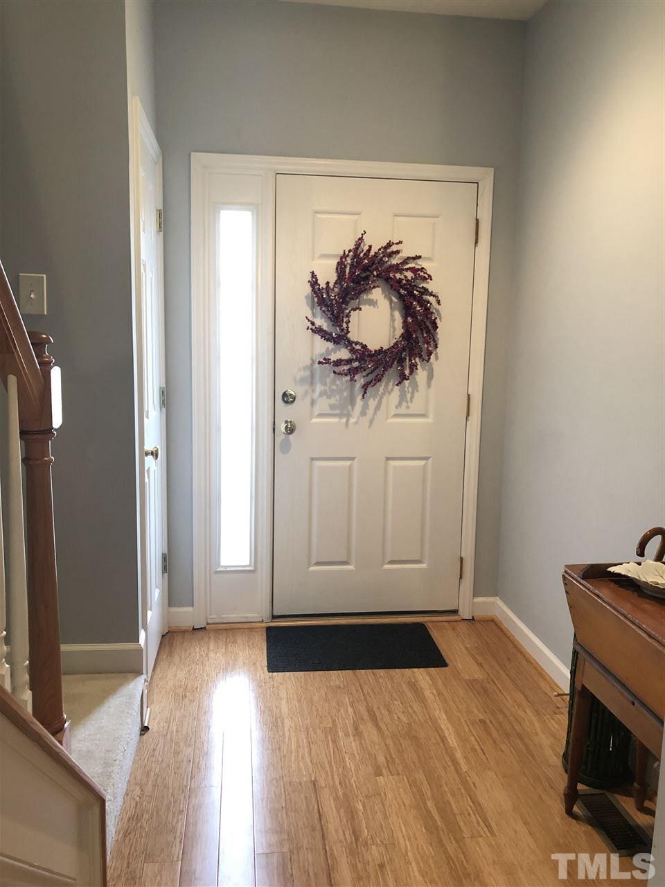 5426 Goldenglow Way Raleigh, NC 27606 - Photo 23 of 25 a view of room with wooden floor