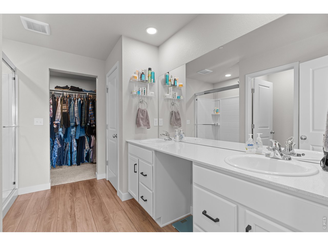 6611 4th Street, Unit 1 Greeley, CO 80634 - Photo 34 of 48 Walk-in closet and double sinks.