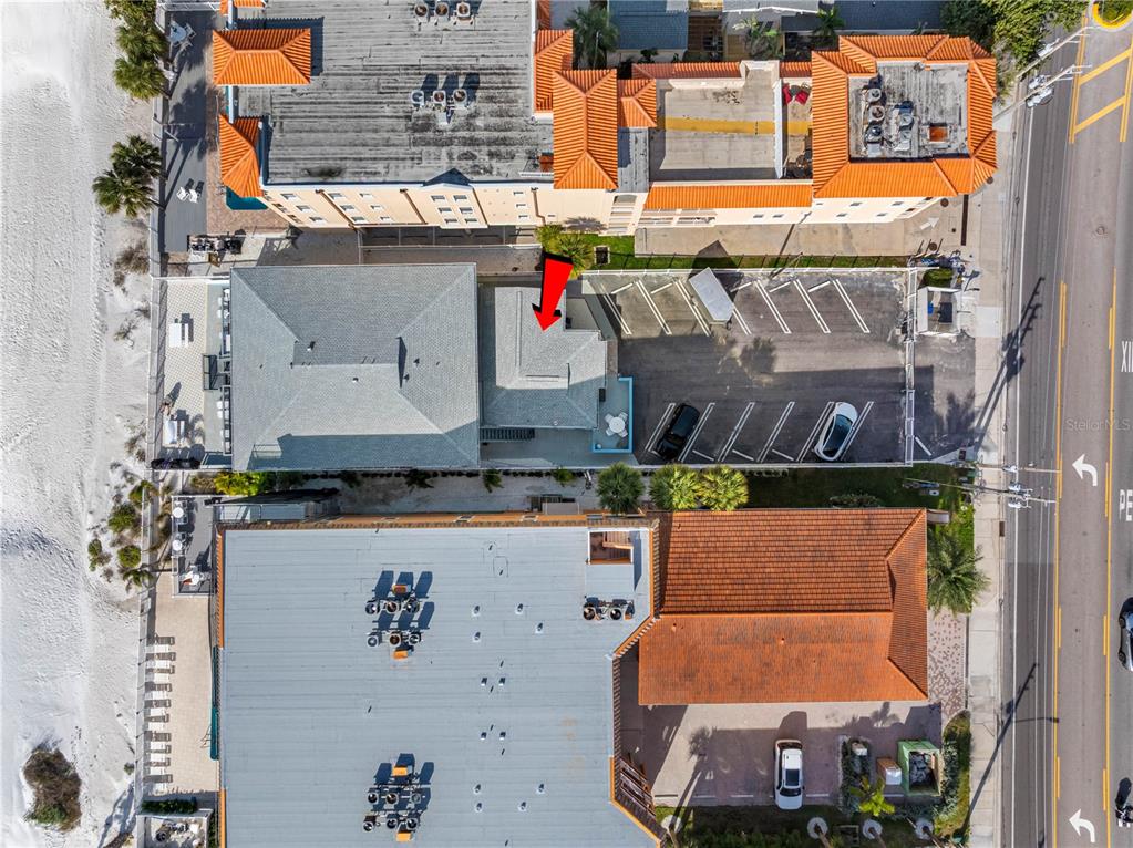 614 Gulf Boulevard, Unit 9 Indian Rocks Beach, FL 33785 - Photo 33 of 41 an aerial view of residential houses with outdoor space