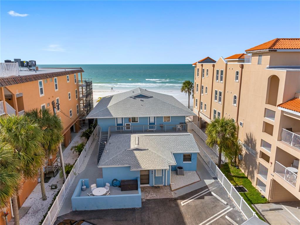 614 Gulf Boulevard, Unit 9 Indian Rocks Beach, FL 33785 - Photo 39 of 41 an aerial view of residential houses with outdoor space and parking