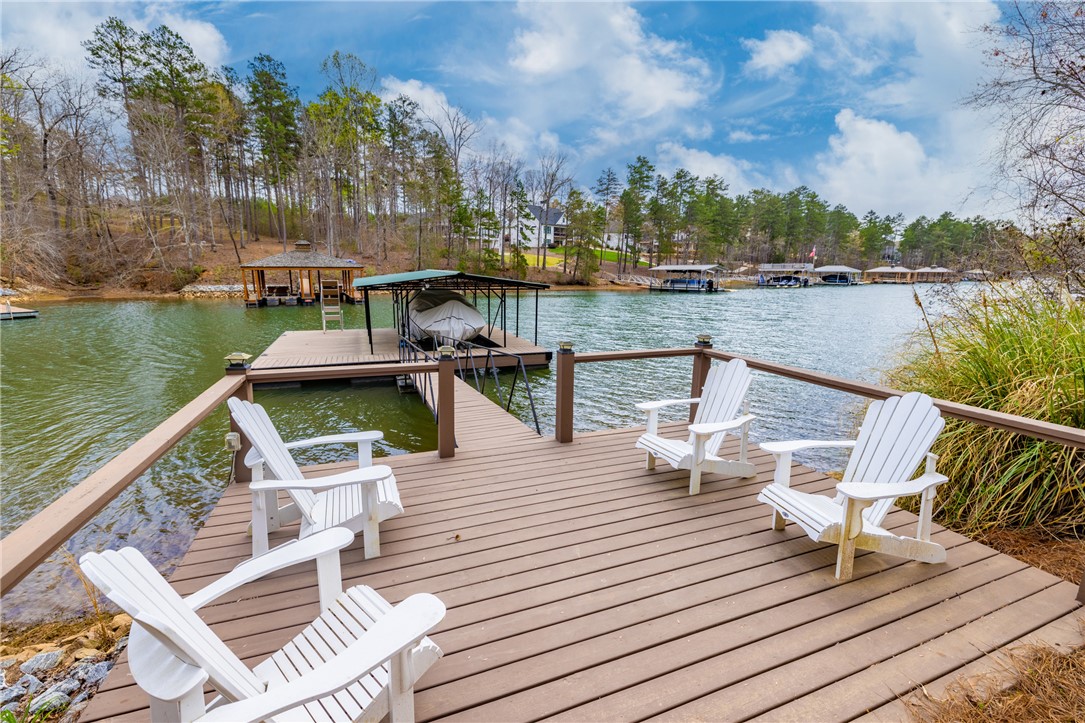 203 Little Lane Seneca, SC 29672 - Photo 38 of 48 Enjoy tranquil waterfront living with private dock access and ample space for relaxation.