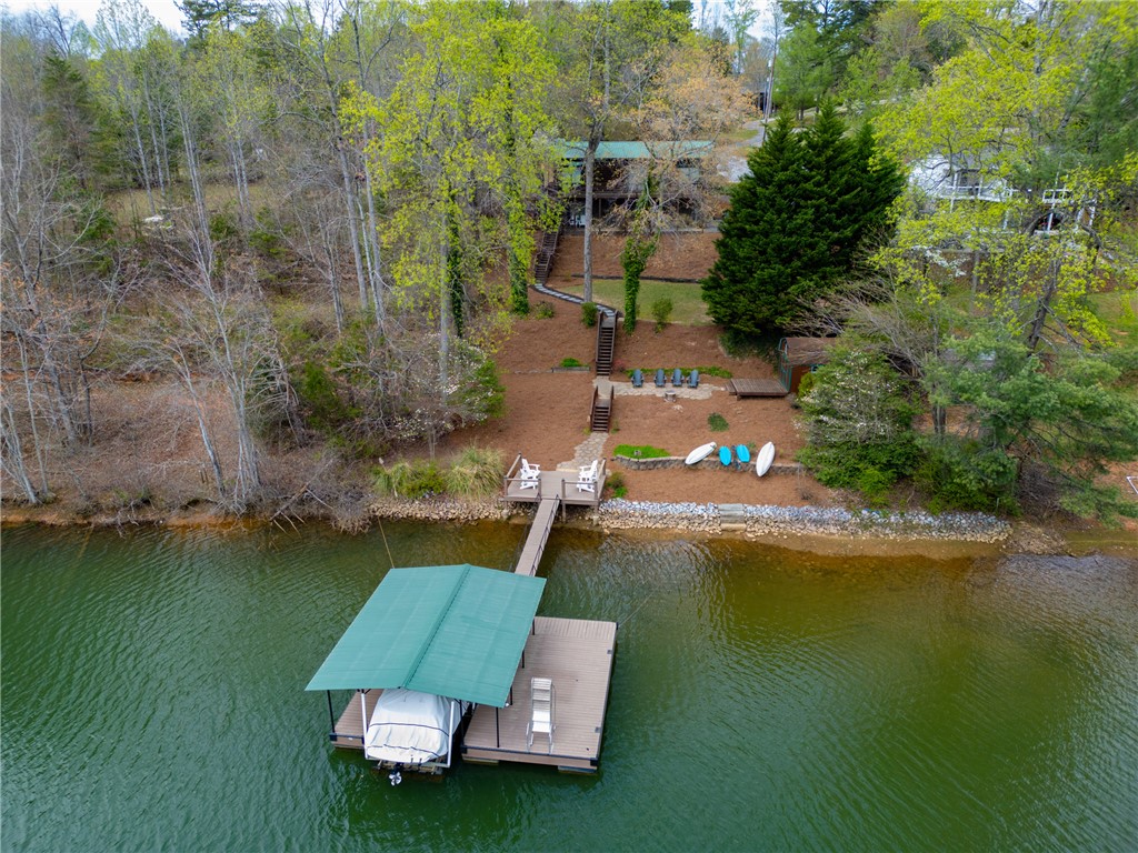 203 Little Lane Seneca, SC 29672 - Photo 43 of 48 This captivating waterfront property offers serene views and private lake access with a dedicated boat dock.