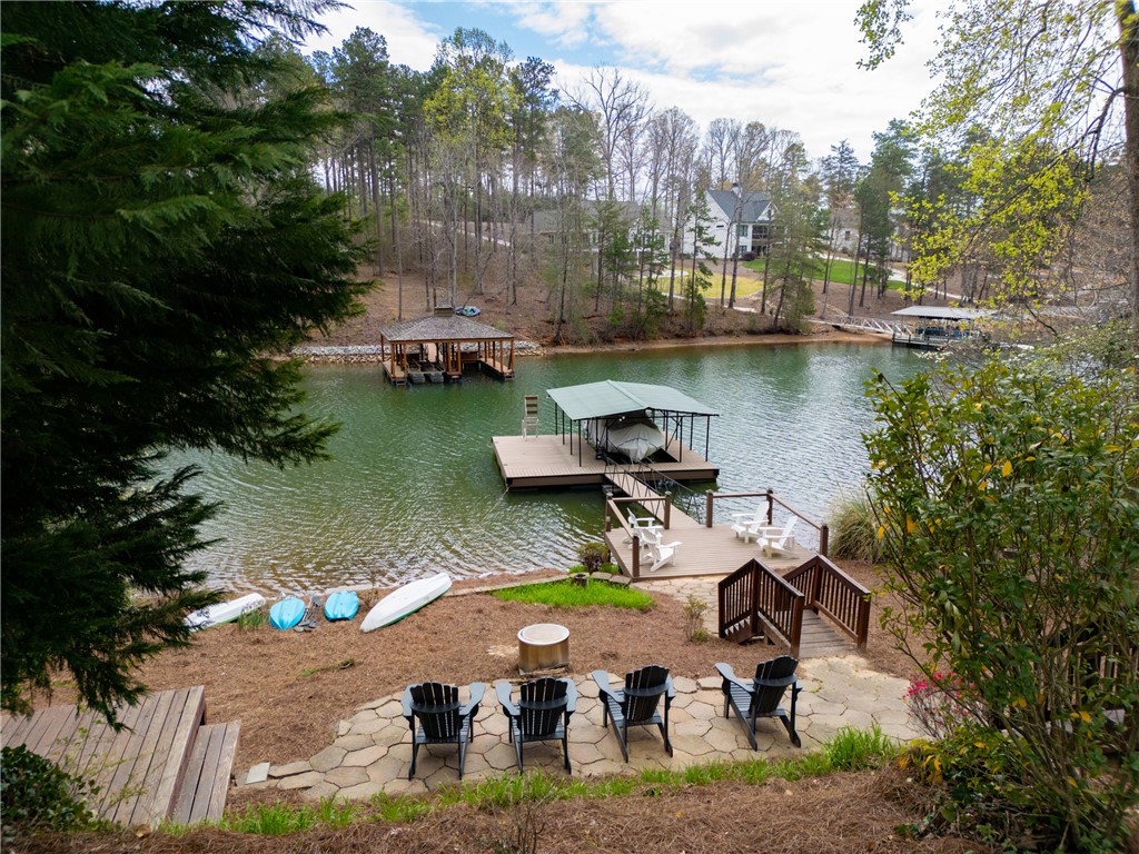 203 Little Lane Seneca, SC 29672 - Photo 46 of 48 This tranquil lakeside property offers direct water access and private boat docks for endless recreation.