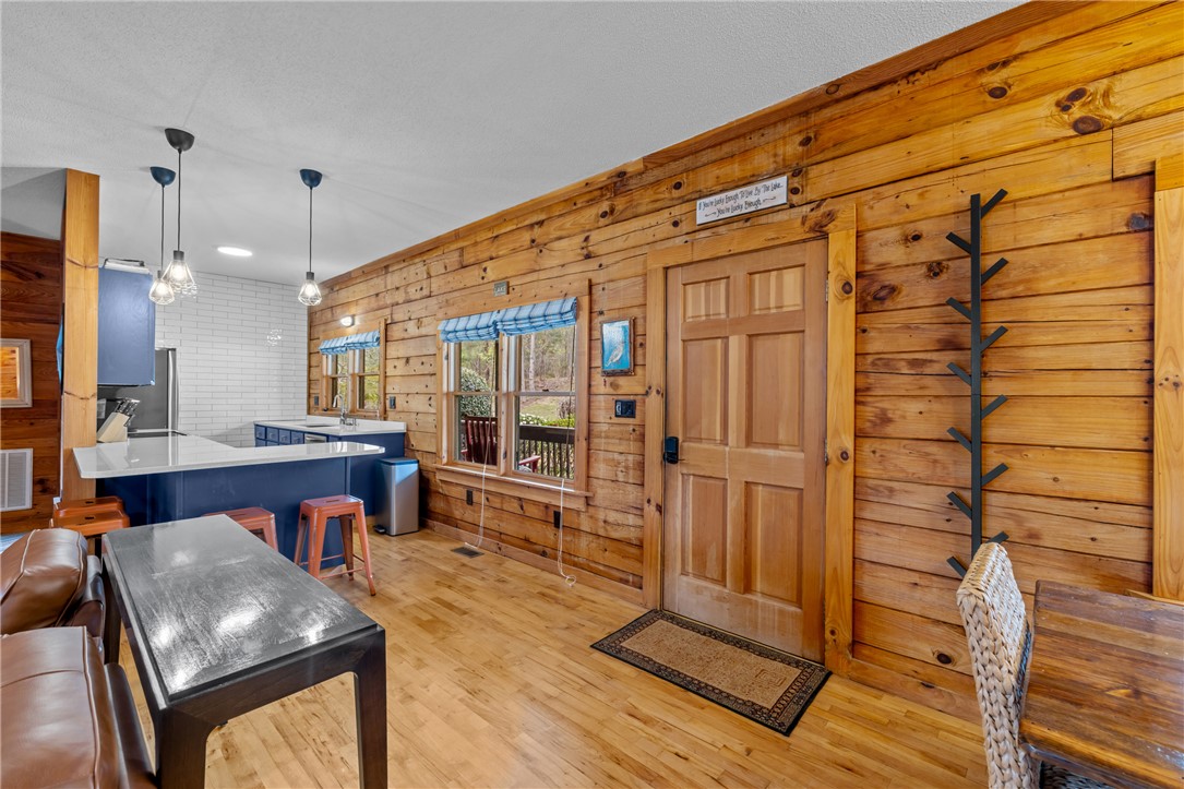 203 Little Lane Seneca, SC 29672 - Photo 7 of 48 This inviting space combines rustic charm with modern amenities, creating a comfortable living area.