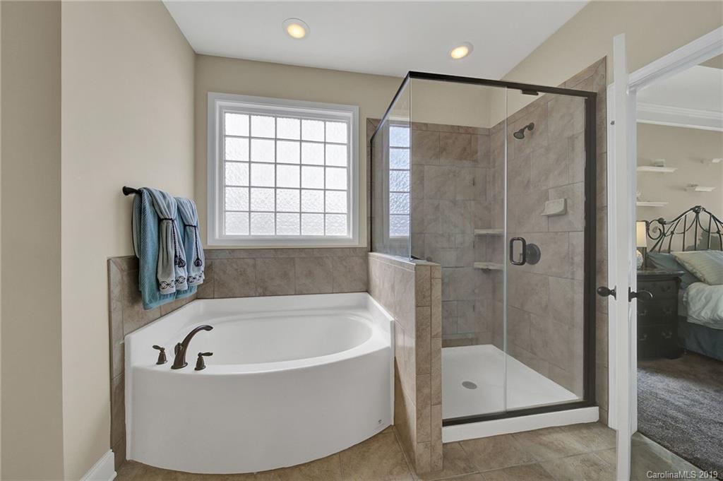79013 Ridgehaven Road Lancaster, SC 29720 - Photo 22 of 30 a bathroom with a bathtub and a shower