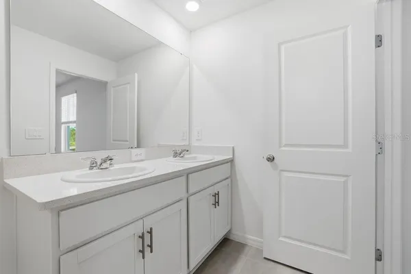 a bathroom with a shower and toilet