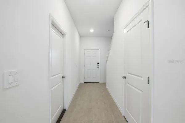 a house view with a backyard space