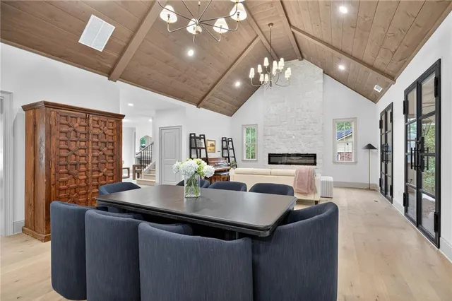 a kitchen with a counter space a sink appliances and cabinets